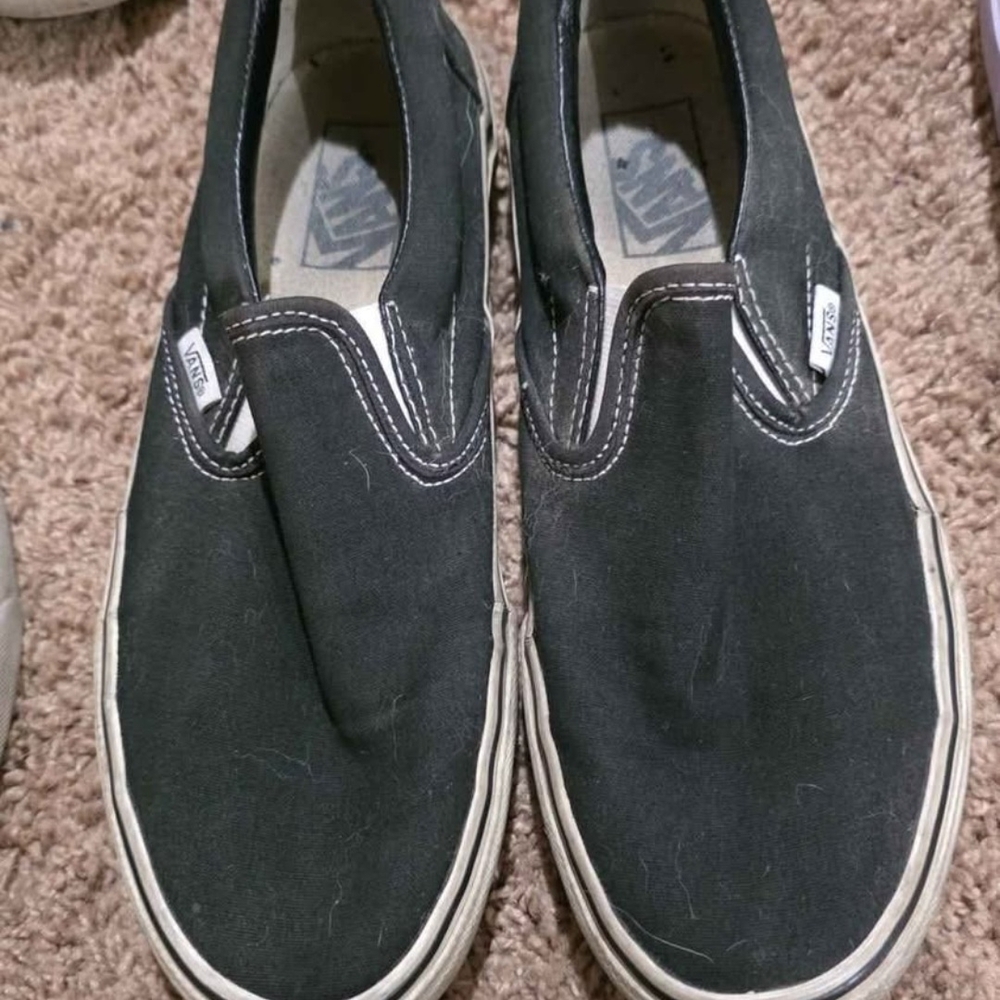 Vans Black Canvas Slip-On Shoes with White Stitching